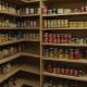 Why standard particleboard shelves fail under canned goods within two years